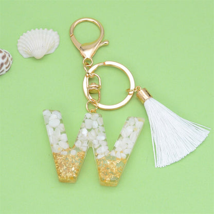 White Stone/Gold Flakes Letter Resin Keyring With White Tassel | Bag Accessory